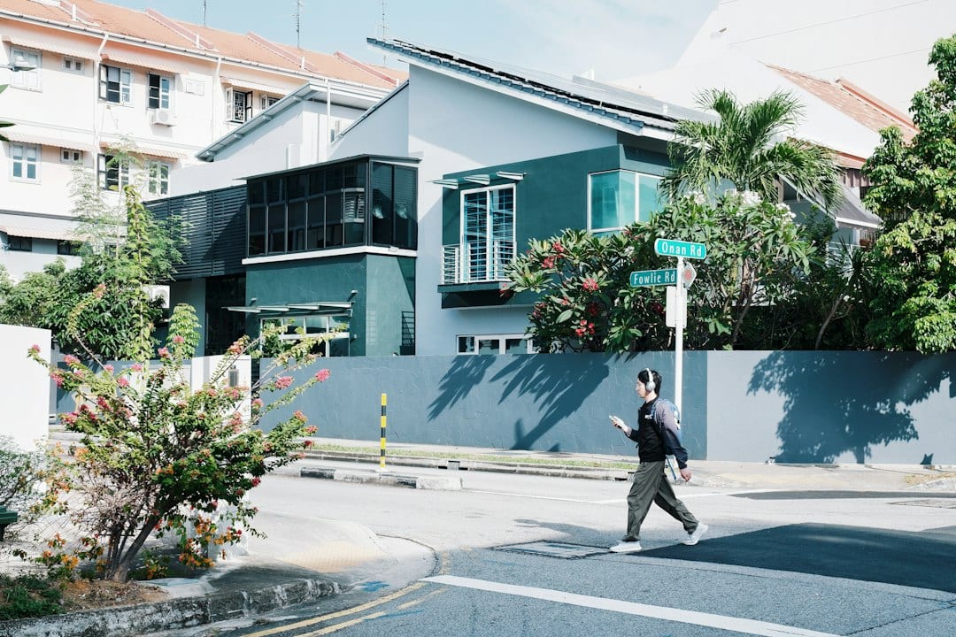 Residential street with modern landed home in Upper Bukit Timah, District 21